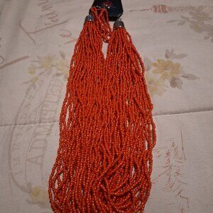 RED NECKLACE NEVER USED